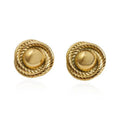 Coco vintage-inspired gold statement earrings by Arella The Label — bold sculptural studs inspired by Coco Chanel style. 