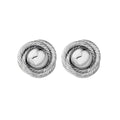 Coco vintage-inspired silver statement earrings by Arella The Label — bold sculptural studs inspired by Coco Chanel style. 