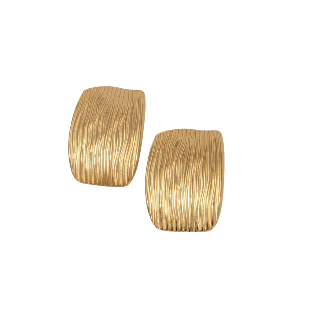 Gold wave earrings with a ribbed texture. Designed by Arella in Los Angeles. 