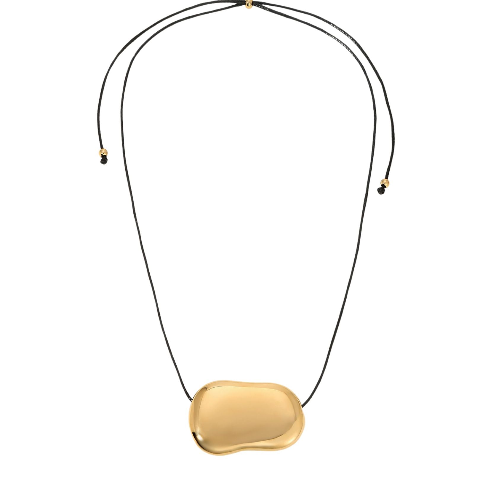 A gold pendant necklace with a rounded bean pendant and a black cord. Sloane corded pendant necklace by Arella The Label — vintage-inspired adjustable cord necklace with gold pendant