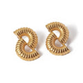 Thea gold spiral statement earrings by Arella The Label — 90s runway-inspired sculptural drop earrings